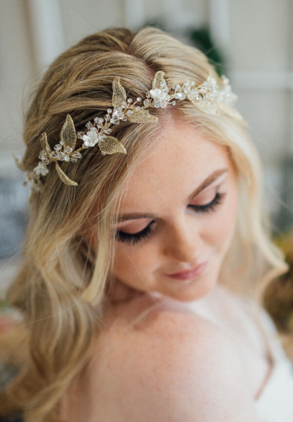 Photo of The White Closet Bride wearing bridal accessories