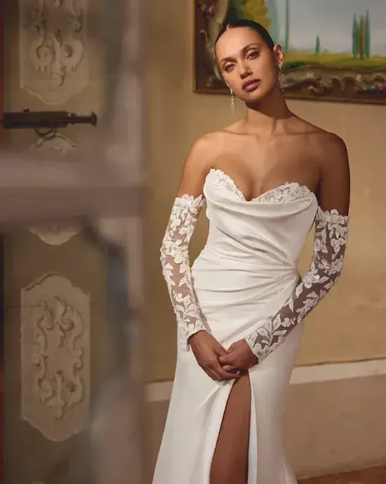 Model is wearing a mikado fit and flare bridal gown 