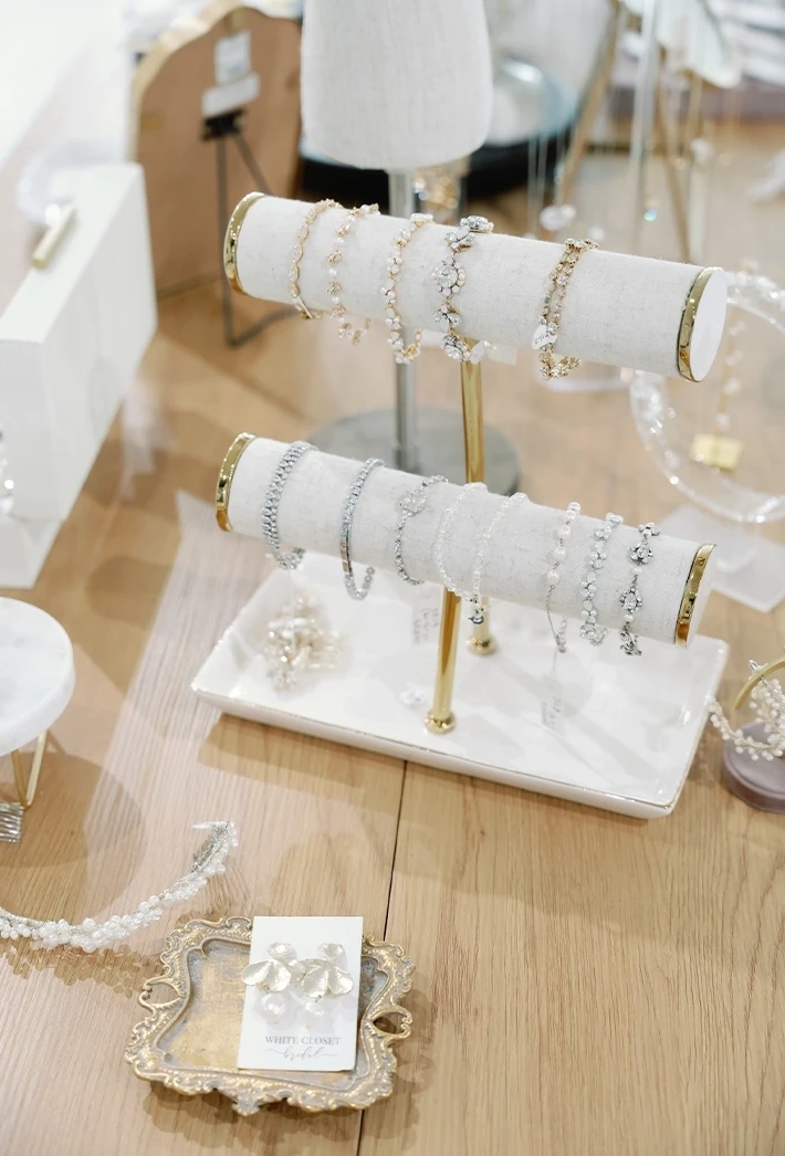 Photo of The White Closet Bride wearing bridal accessories